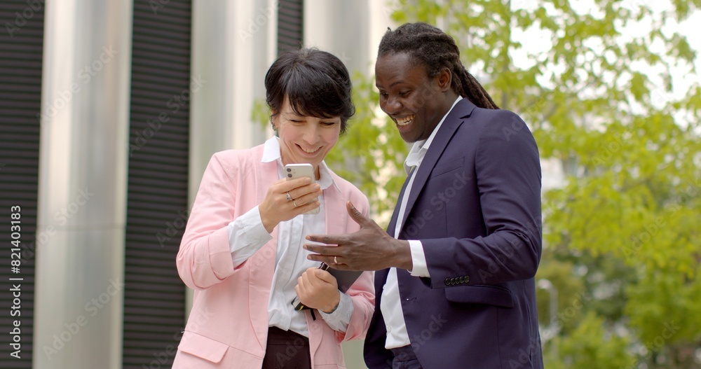 Man and woman turning to artificial intelligence for guidance, seeking advice information to aid in decision making process. Utilize smartphones to access AI-powered applications or virtual assistants