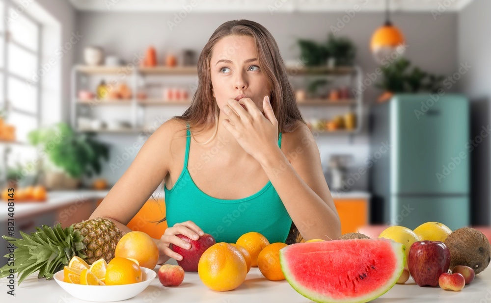 Sports Nutrition. Young slim Woman eat fruits Sports Nutrition. Young slim Woman eat fruits