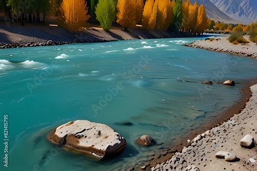 Autumn scene, blue turqu oise water of Gilgit river flowing through Gupis,Pakistan. Autumn scene, blue turquoise water of Gilgit river flowing through Gupis, Ghizer, Gilgit-Baltistan, Pakistan.
 photo