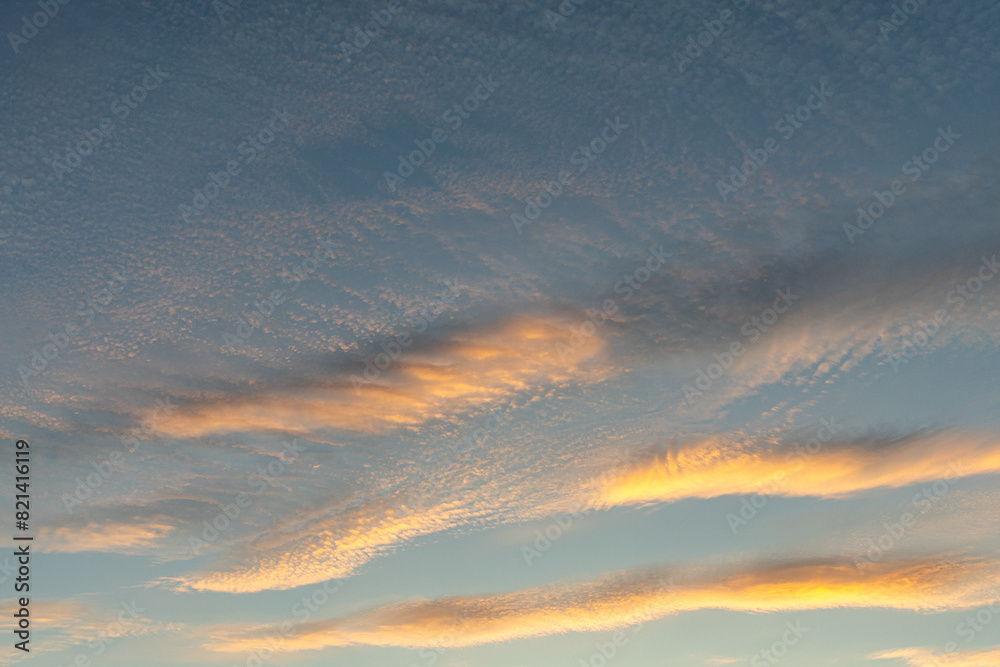 orange clouds at sunset in sky orange clouds at sunset in sky