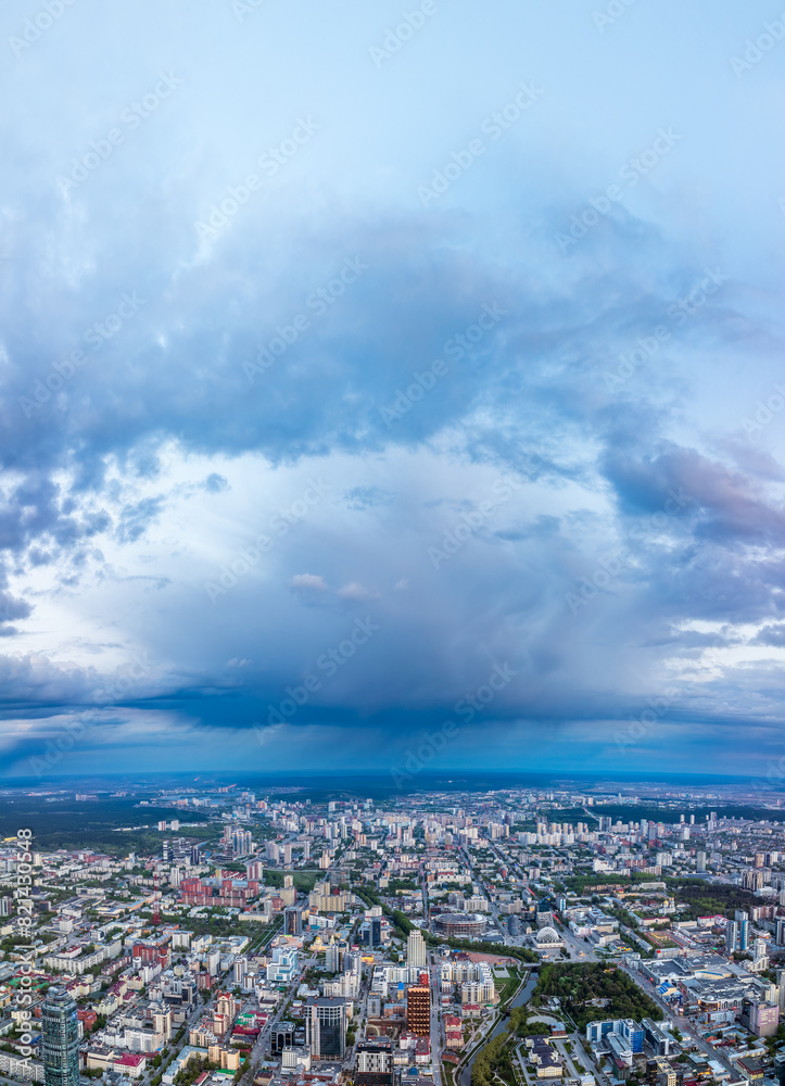 Yekaterinburg aerial panoramic view in summer sunset. Ekaterinburg is the fourth largest city in Russia located in the Eurasian continent on the border of Europe and Asia.