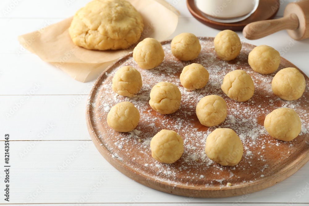 Shortcrust pastry. Raw dough balls on white wooden table Shortcrust pastry. Raw dough balls on white wooden table