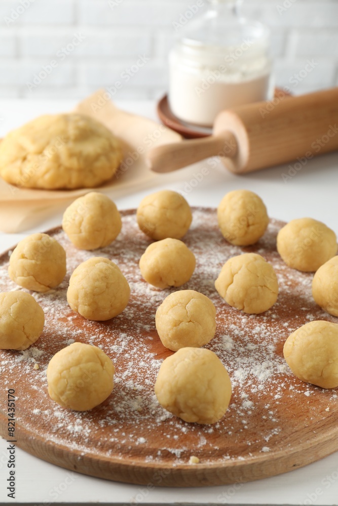 Shortcrust pastry. Raw dough balls on white table Shortcrust pastry. Raw dough balls on white table
