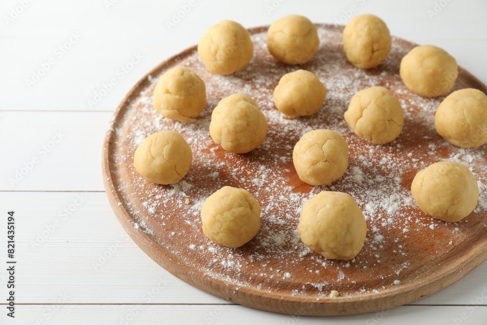 Shortcrust pastry. Raw dough balls on white wooden table Shortcrust pastry. Raw dough balls on white wooden table