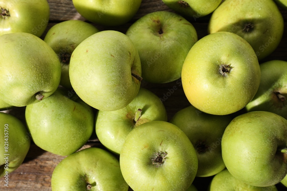 Many fresh apples on wooden table, top view Many fresh apples on wooden table, top view