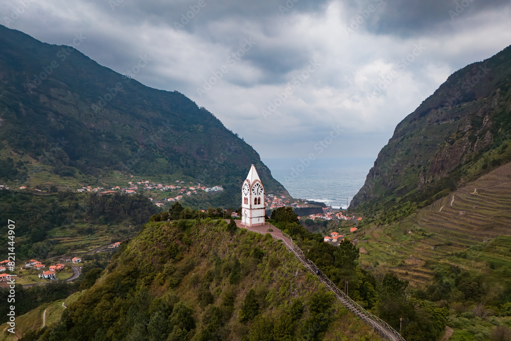 Clock tower Chapel of Our Lady of Fatima in Sao Vicente town in Madeira island, Aerial view