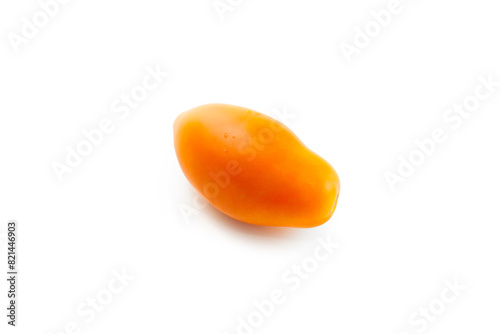 Yellow tomato isolated on white background with clipping path. .