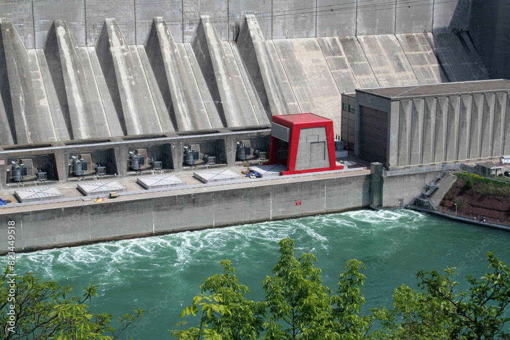 A huge hydro electric power plant on a river.