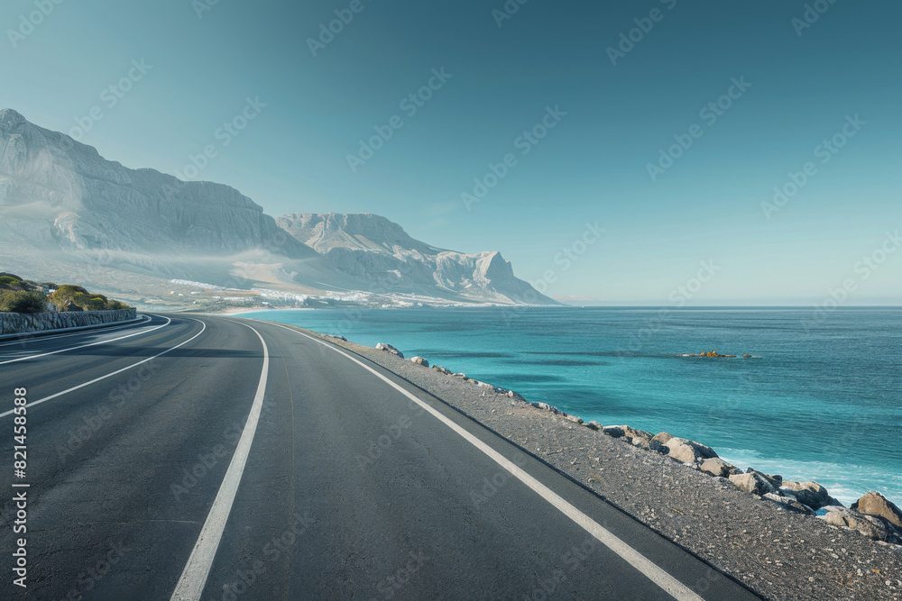 Empty asphalt road by the lake
