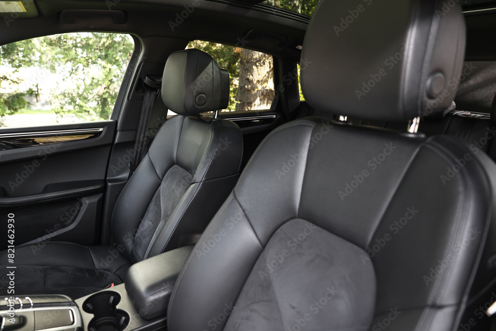 Clean leather seats inside of modern black car Clean leather seats inside of modern black car