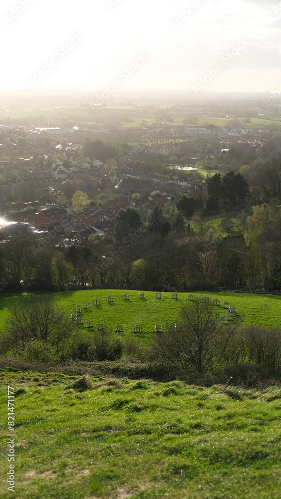 Obraz premium Scenic landscape overlooking the rural countryside of Somerset Levels from Glastonbury Tor in England UK