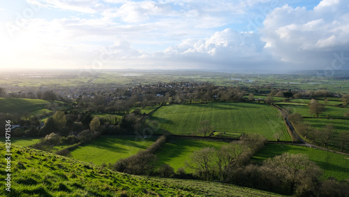 Scenic aerial landscape view overlooking the Somerset Levels and rural farmland countryside from The Tor in Glastonbury, England UK