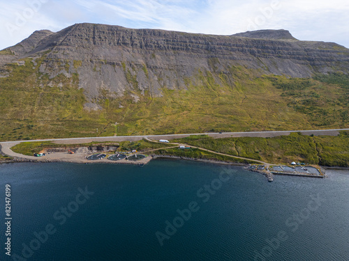 Fish farming basins at the coast of Talknafjordur in the westfjords of Iceland photo