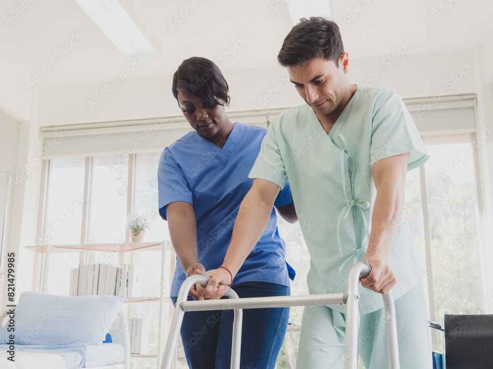 Obraz premium Portrait patient caucasian man sit wheelchair with woman nurse black people carer physical therapist two person talk helping support give advice feel relax smile happy in hospital clinic room service.