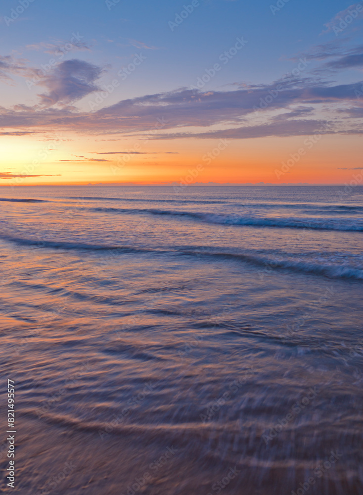 Blue and Orange Sky Sunset Over Ocean Blue and Orange Sky Sunset Over Ocean