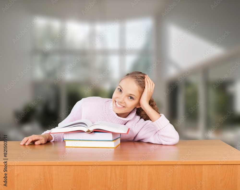 Smiling pretty young woman searching for information Smiling pretty young woman searching for information