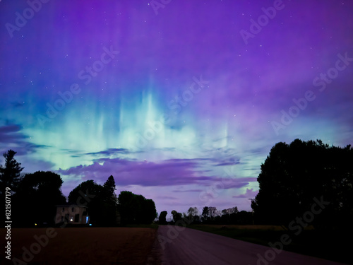 The Aurora Borealis, or Northern Lights, are a natural light display in the Earth's sky, primarily seen in high-latitude regions. They appear as colorful, shimmering curtains or arcs.