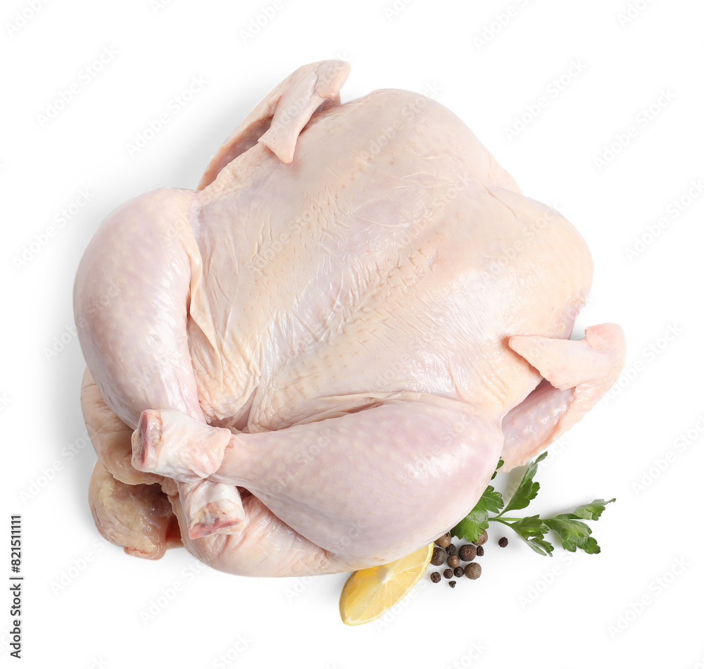 Fresh raw chicken with lemon and spices isolated on white, top view Fresh raw chicken with lemon and spices isolated on white, top view