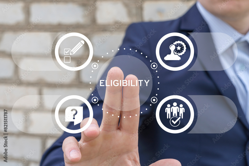Business man working on virtual touch screen presses word: ELIGIBILITY. Eligibility concept. Are you eligible? Eligible, adept, adequate, capable, competent business finance concept.