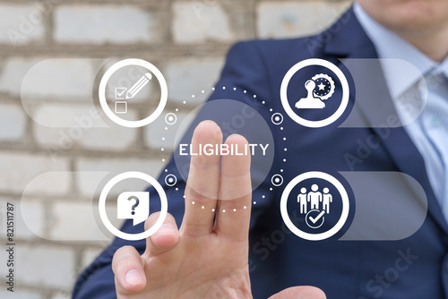 Obraz na płótnie Business man working on virtual touch screen presses word: ELIGIBILITY. Eligibility concept. Are you eligible? Eligible, adept, adequate, capable, competent business finance concept. w salonie