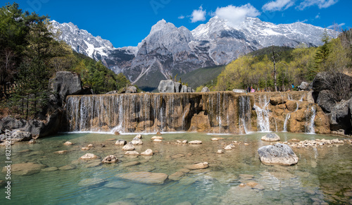 Waterfalls at the foothill of Jade Dragon Snow Mountain in Yulong Naxi Autonomous County, Lijiang, in Yunnan province, China. photo