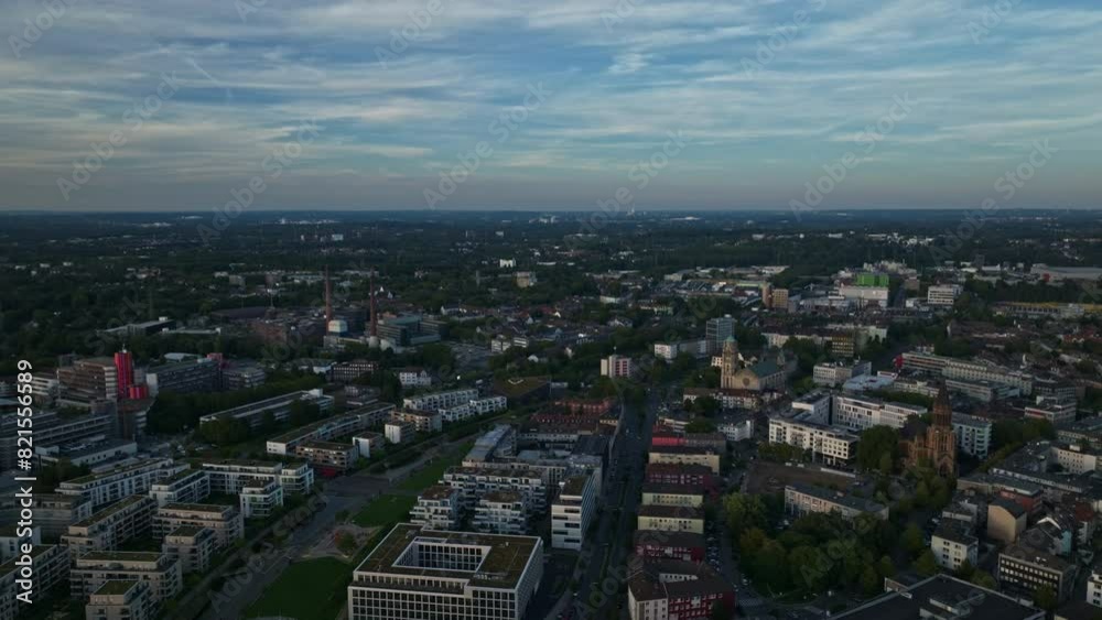 Aerial drone view of Essen city center, also known as Essen-Stadtkern, in Germany at sunset. Aerial drone view of Essen city center, also known as Essen-Stadtkern, in Germany at sunset.