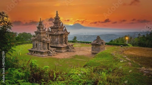 Gedongsongo temple at the morning with dramatic sky. one of spot tourism destination of Semarang central java. seamless looping 4k video background.  photo