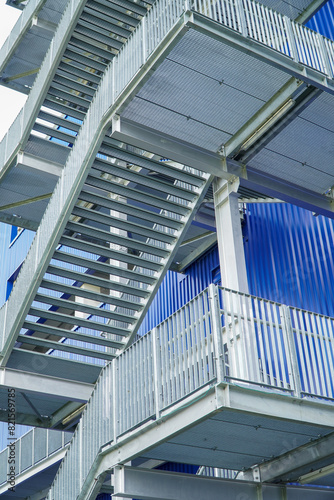 steel staircase structure outside the building, fire escape stair steel. © Apicha