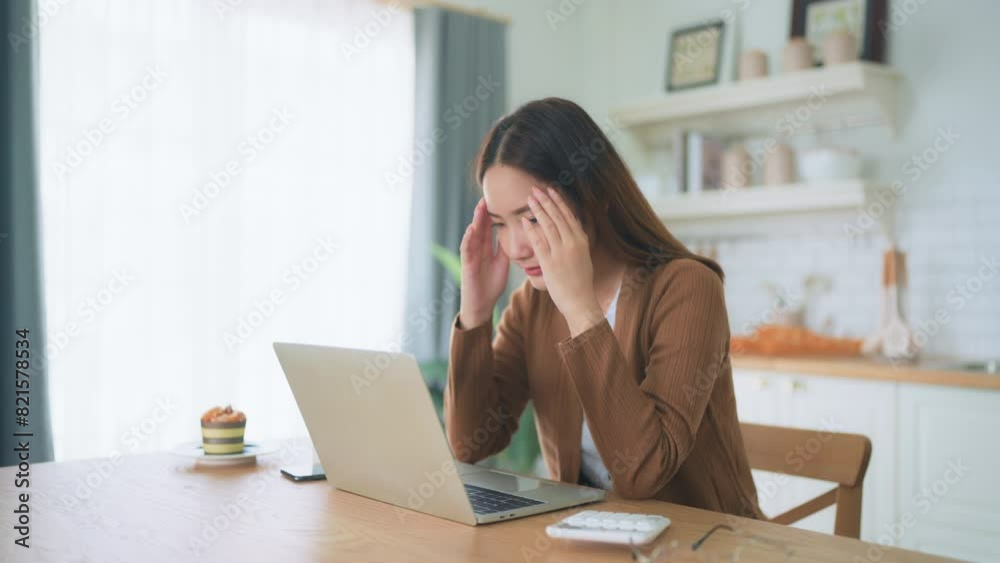 Office syndrome. Overworked tired young asian woman feeling headache, having eyesight problem after computer laptop work. Stressed young woman suffering from fatigue at home Office syndrome. Overworked tired young asian woman feeling headache, having eyesight problem after computer laptop work. Stressed young woman suffering from fatigue at home