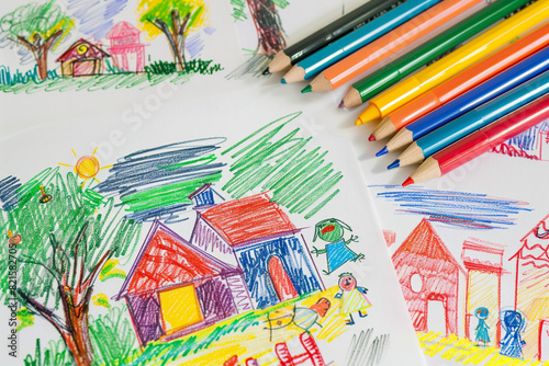 paintings drawn by children with colored pens. The paintings are very good, including characters, landscapes and animals. These four pictures are put together and photographed. © jixiang