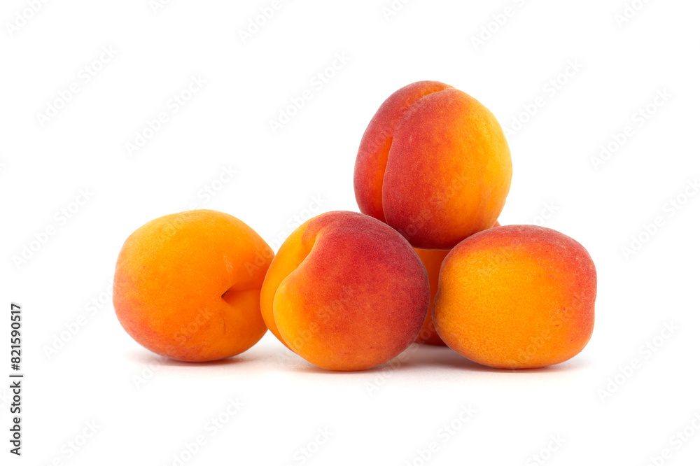 Pile of ripe apricots isolated on a white background Pile of ripe apricots isolated on a white background