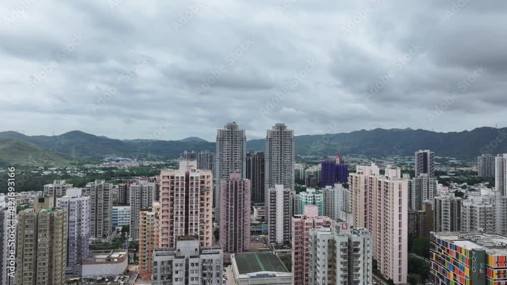 Aerial view of YOHO Hub, a massive integrated development featuring residential towers, rail station, and shopping complex in Hong Kong Yuen Long Northern Metropolis Aerial view of YOHO Hub, a massive integrated development featuring residential towers, rail station, and shopping complex in Hong Kong Yuen Long Northern Metropolis
