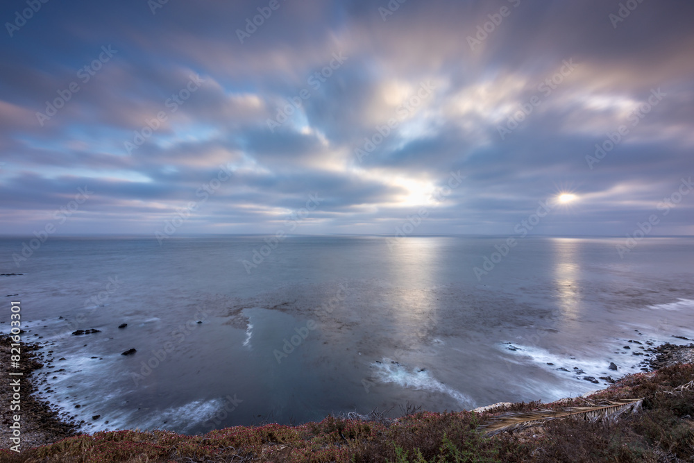 Fototapeta premium Golden Cove Tranquility at Sunset