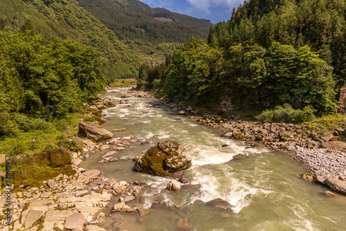 Mountain river nearby Yawu Lake under the Wawu Mountain, in Meishan City of southwest China’s Sichuan Province photo