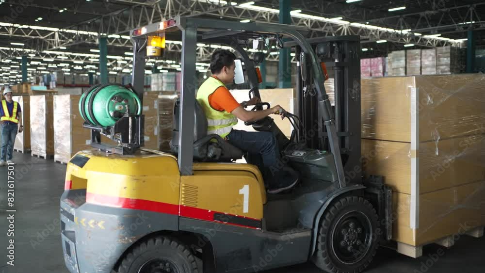 Logistic workers are working at logistic warehouse. Logistic workers are working at logistic warehouse.