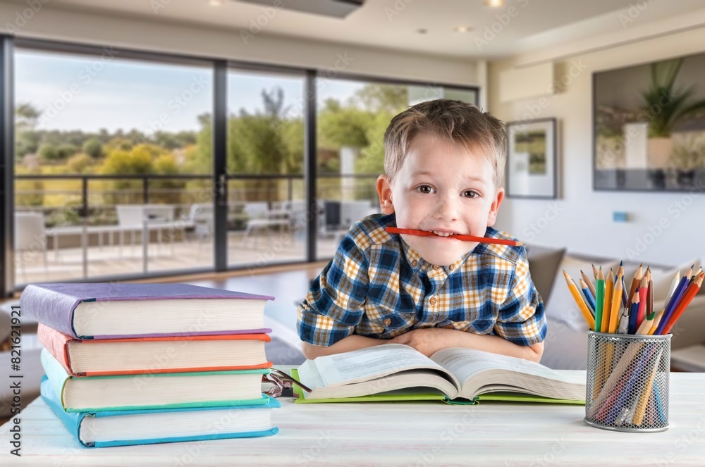 Focused pupil student studying at home Focused pupil student studying at home