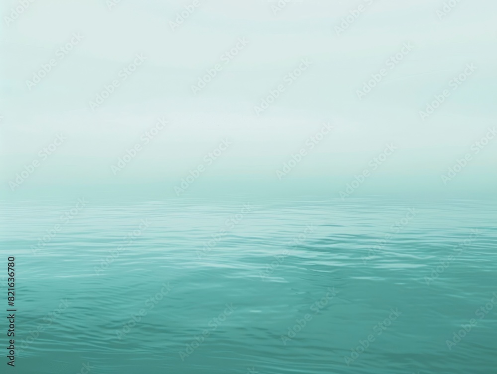 A calm body of water with a light blue color. The water is still and peaceful. The sky is cloudy and gray, creating a moody atmosphere