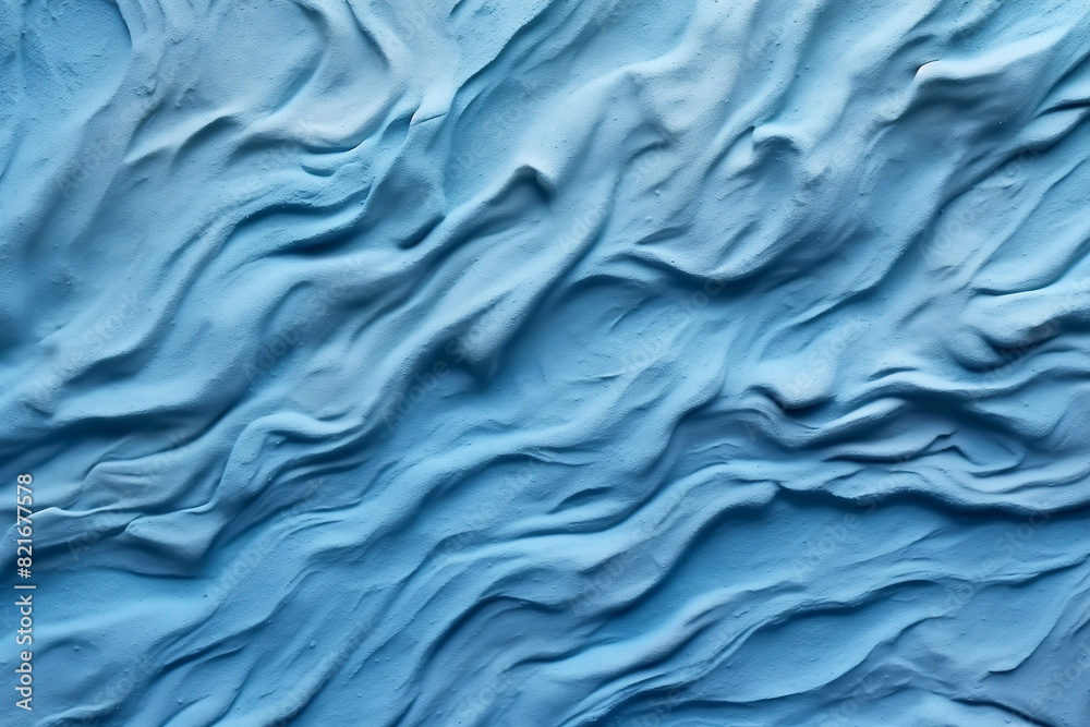 Relief empty blue plaster wall close-up.