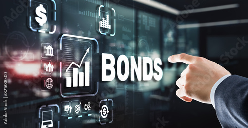 Cuadro en lienzo Businessman clicks a bonds virtual screen