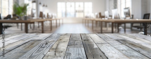 Blurred Empty Light Gray Wooden Table with Office Interior Background © JH
