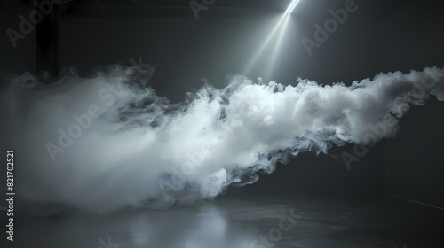 A cloud of smoke swirling in a dark room, with a single beam of light illuminating the particles