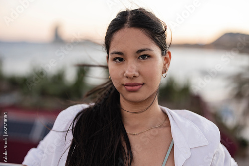 Close-Up Portrait of a Young Woman at the Beach