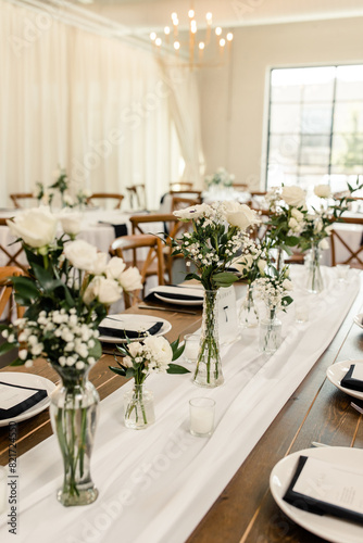 Elegant table setting with white floral decor
