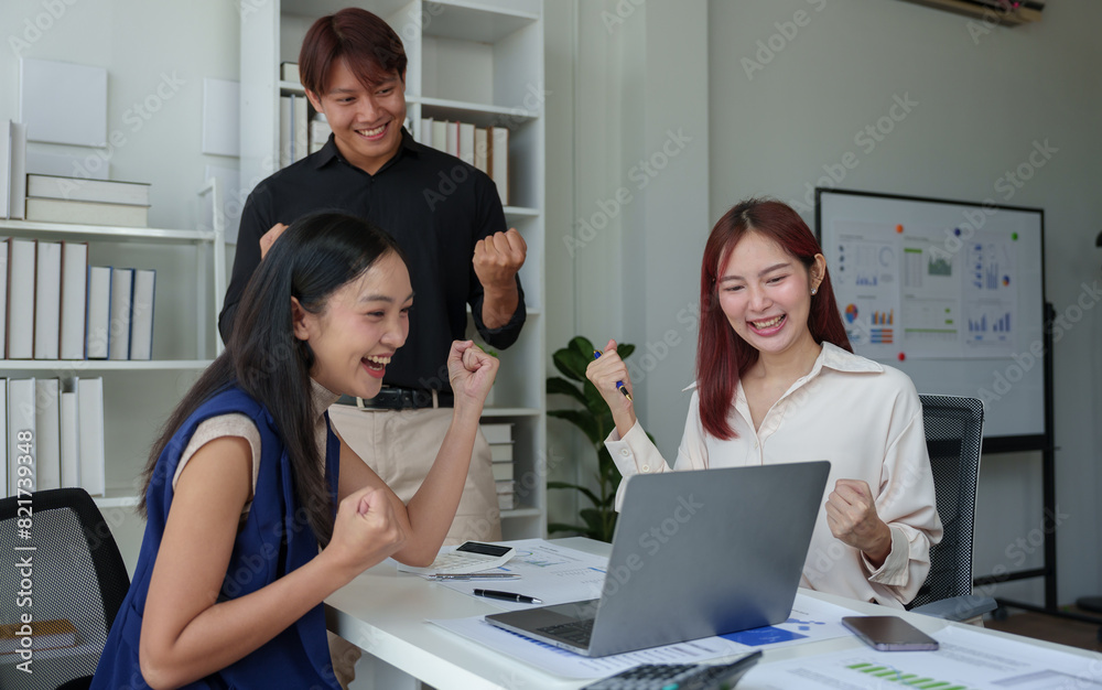 A team of young entrepreneurs and Asian startups Happy and grateful for success, encouraging each other for strength, positive concept, fighting with online work, successful marketing plan concept. A team of young entrepreneurs and Asian startups Happy and grateful for success, encouraging each other for strength, positive concept, fighting with online work, successful marketing plan concept.