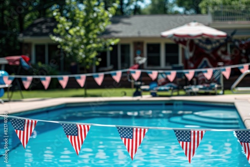 A backyard pool decorated with American flag bunting for a festive celebration. The pool area is complemented by lawn chairs and a gazebo, set against a backdrop of lush greenery.