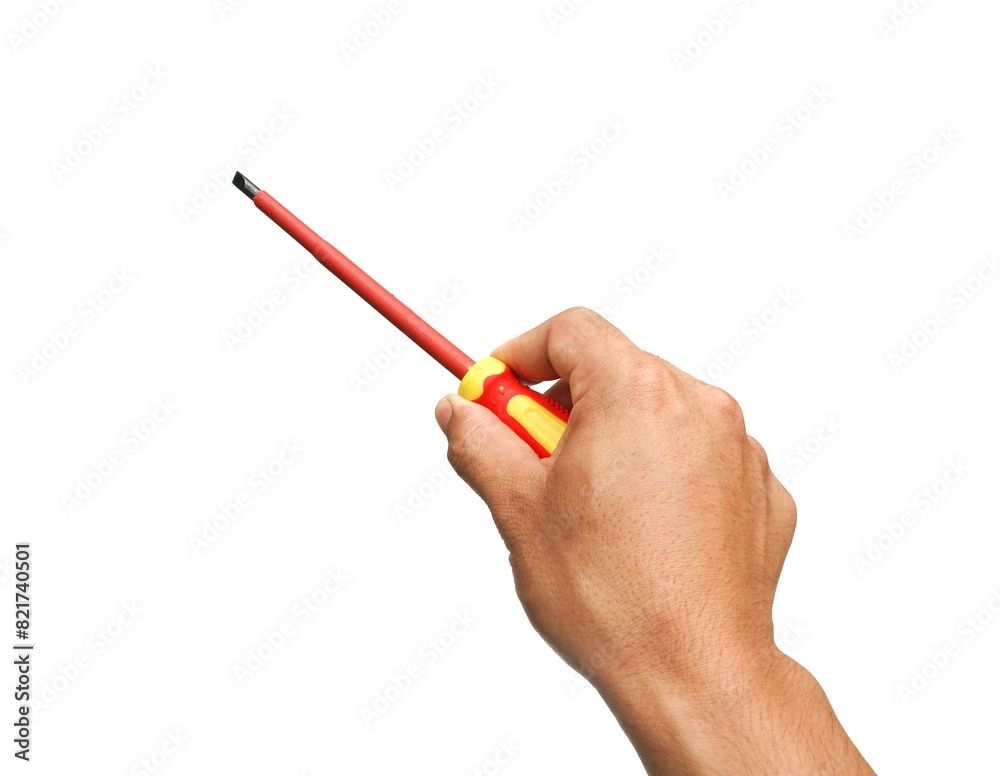 A man's hand holds a yellow and red tool called a screwdriver for use in general mechanical, electrical, and general mechanics work. Equipment for tightening nut heads isolated on white background. A man's hand holds a yellow and red tool called a screwdriver for use in general mechanical, electrical, and general mechanics work. Equipment for tightening nut heads isolated on white background.