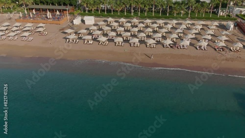 Aerial drone shot of Mediterranean Beach early in the morning. photo