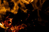 fire flame with sparks on black background.