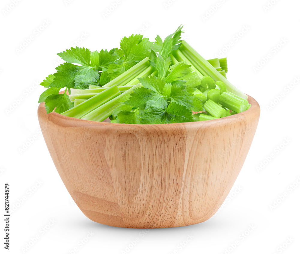 Celery in wood bowl isolated on transparent png Celery in wood bowl isolated on transparent png