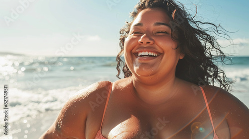 Plump woman having fun against the backdrop of the sea